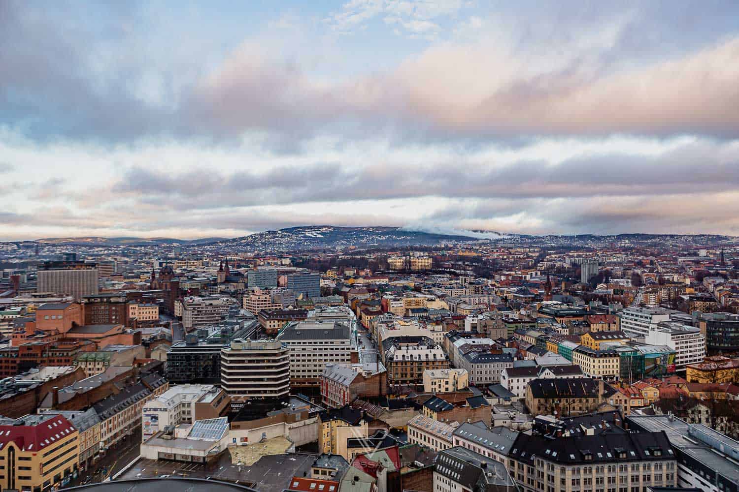 Sightseeing Oslo - Holmenkollen - view ski jump - Holmenkollen ski jump view over Oslo as winter sports place. Top sightseeing and travel tips Oslo. View from the ski jump, Sightseeing Oslo