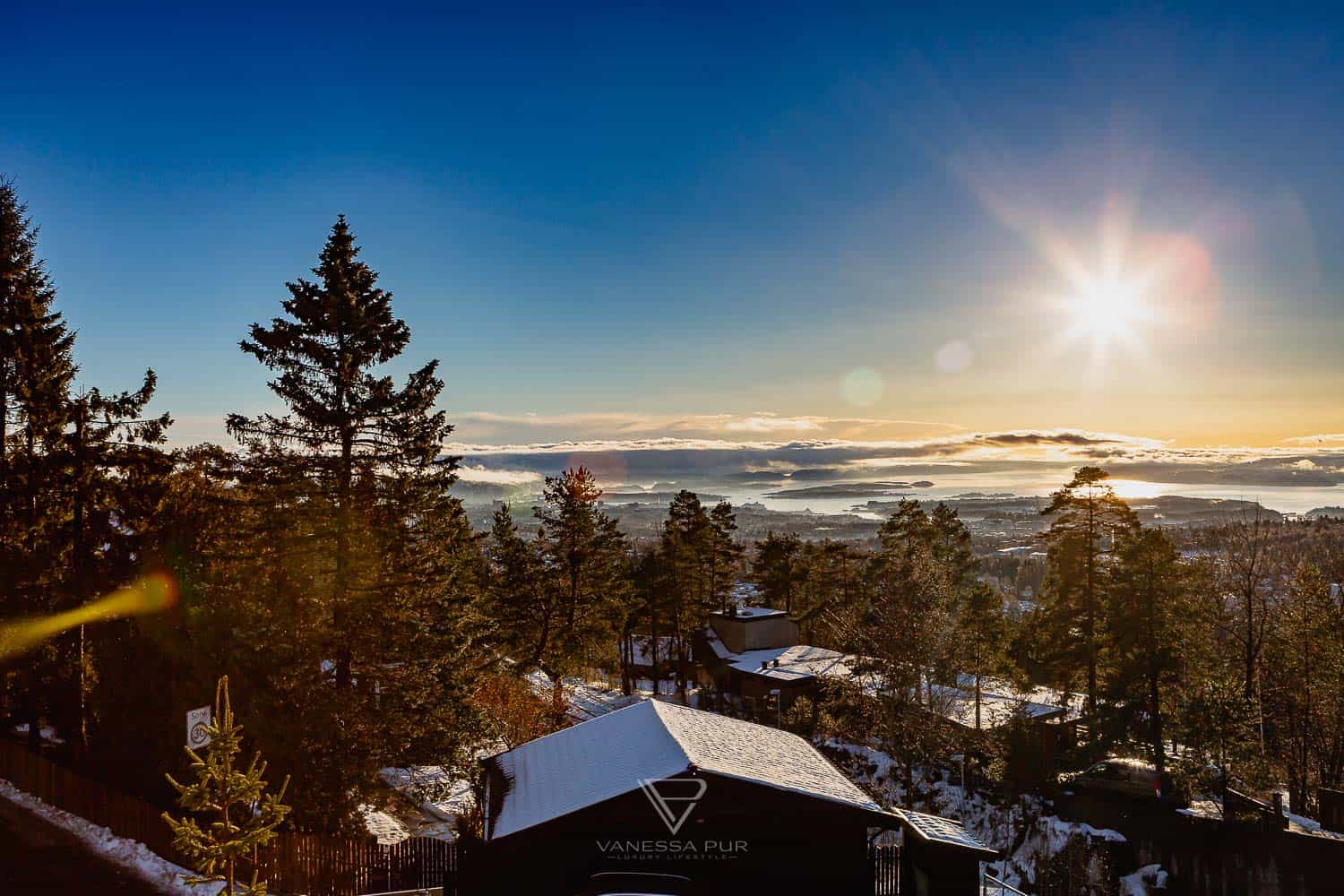 Sightseeing Oslo - Holmenkollen - view ski jump - Holmenkollen ski jump view over Oslo as winter sports place. Top sightseeing and travel tips Oslo. View from the ski jump, Sightseeing Oslo