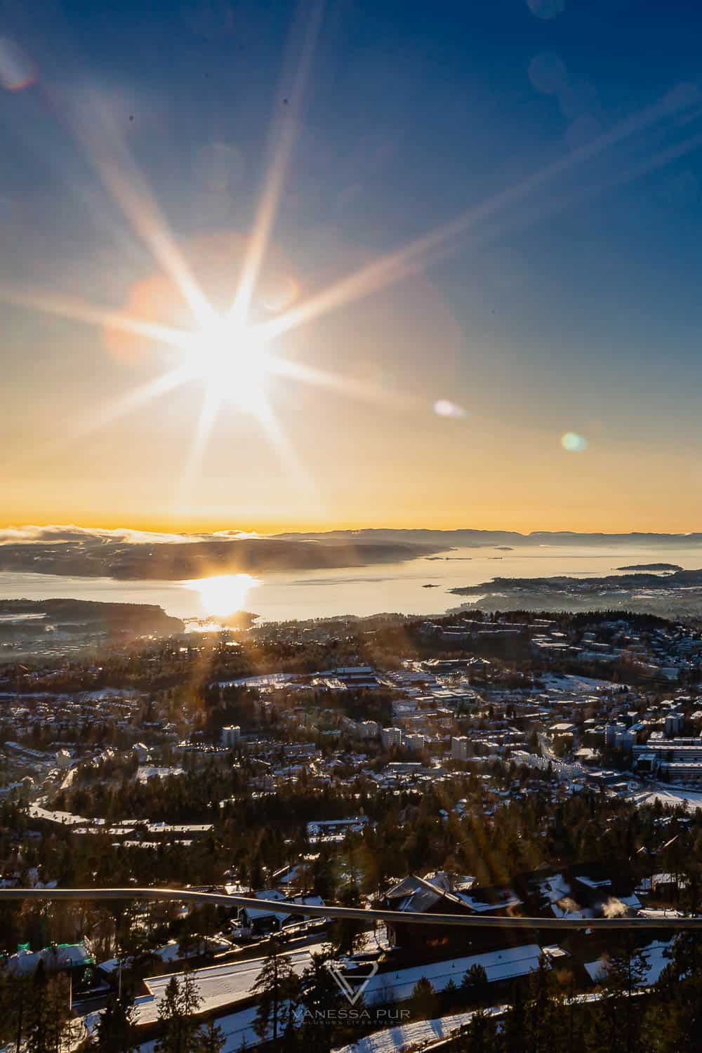 Sightseeing Oslo - Holmenkollen - view ski jump - Holmenkollen ski jump view over Oslo as winter sports place. Top sightseeing and travel tips Oslo. View from the ski jump, Sightseeing Oslo