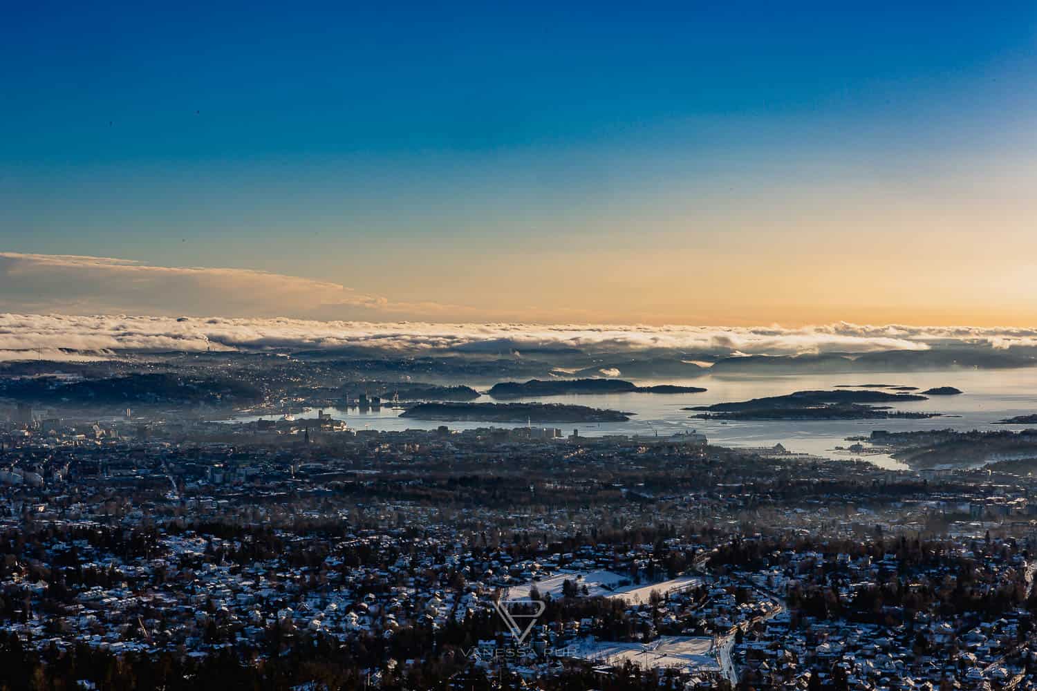 Sightseeing Oslo - Holmenkollen - view ski jump - Holmenkollen ski jump view over Oslo as winter sports place. Top sightseeing and travel tips Oslo. View from the ski jump, Sightseeing Oslo