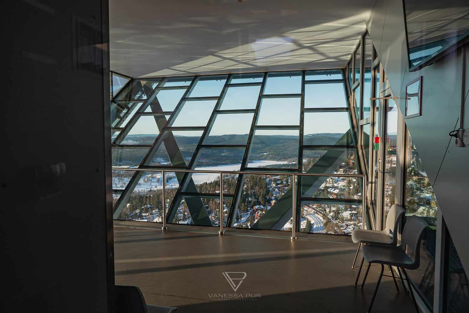 Sightseeing Oslo - Holmenkollen - view ski jump - Holmenkollen ski jump view over Oslo as winter sports place. Top sightseeing and travel tips Oslo. View from the ski jump, Sightseeing Oslo